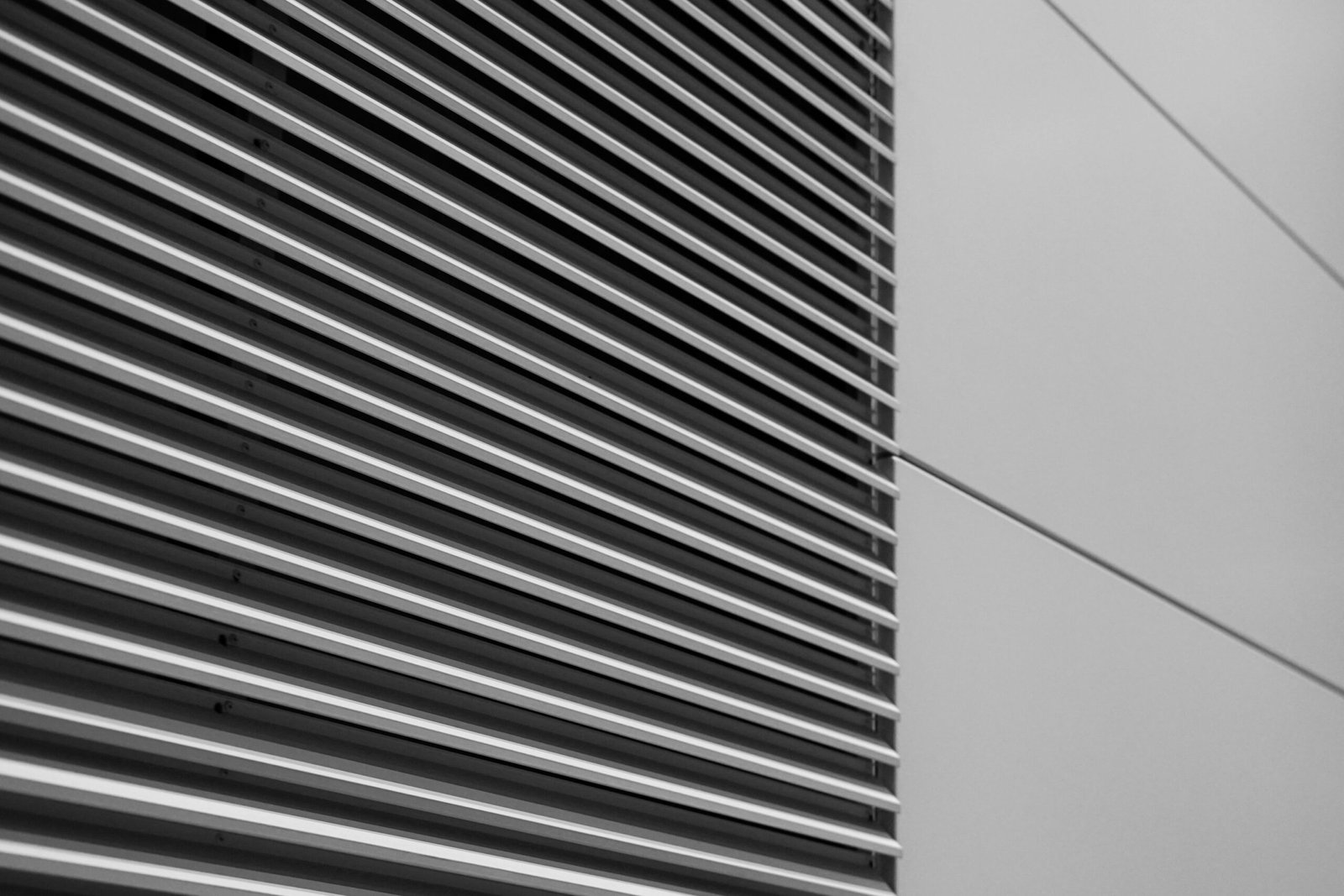 a black and white photo of the side of a building